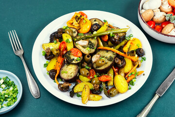 Roasted hot vegetables on a plate.