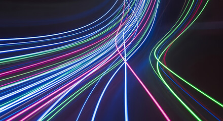 Abstract light streaks in vibrant colors suggesting speed and technology