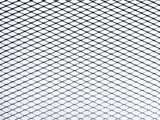 Abstract geometric metal grid pattern with symmetrical diamond shapes