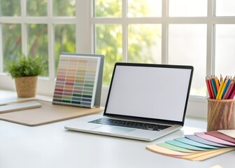 Fototapeta premium Bright Modern Workspace with Laptop and Color Palettes