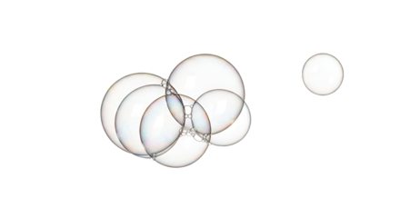 Realistic transparent soap bubbles floating in the air on a white background.