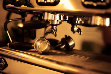 A close-up shot of a professional espresso machine and its components, ready to make a perfect coffee.