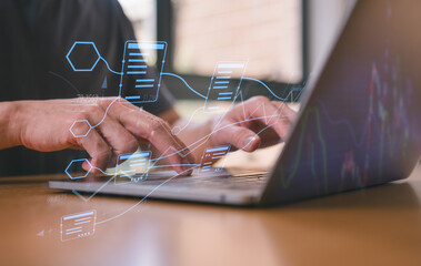 Hands typing on laptop with futuristic digital interface and data flow hologram, representing big data analytics, cloud computing, fintech, and artificial intelligence