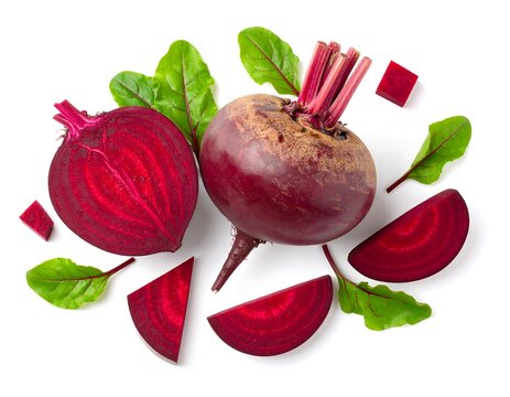 Fresh beetroot slices and leaves
