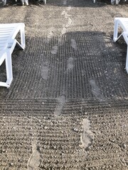 [Spain] The sandy beach of Burriana beach with footprints (Nerja)
