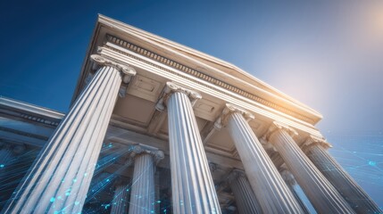 Majestic classical building with tall columns and sunlight shining from above, viewed from a low angle against a clear blue sky