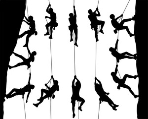 Silhouettes of Rock Climbers in Action"