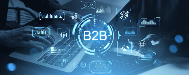 B2B digital marketing and data analytics concept with business technology icons over hands typing on laptops in modern interface environment.