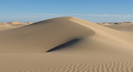 Desert's Gentle Curve: Wind-Sculpted Sands