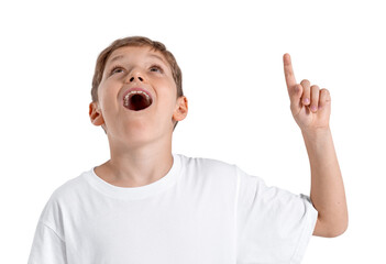 Excited young boy pointing up with open mouth and amazed express