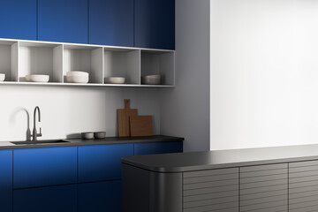 Modern kitchen interior design with sleek blue cabinets, open shelving, and minimalist decor in a bright setting. 3D Rendering. 3D Rendering