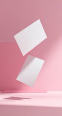 Two blank white cards float against a pink background (2)