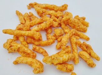 Crunchy Cheese Flavored Snack Sticks on White Background