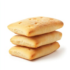 Stack of three rectangular, light-golden-brown crackers or biscuits, slightly textured, stacked vertically against white background