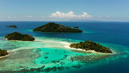 Fototapeta premium Lush tropical islands emerge from vibrant turquoise waters, showcasing a stunning array of natural beauty under a clear blue sky.