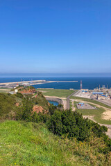 Obraz premium Gijón port settlements amidst scenic coastal landscapes in Gijón, Asturias, Spain