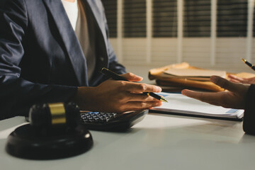 Lawyer explained to the client about the law that must be brought against the court case.