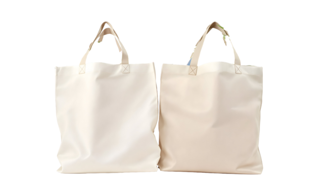 Two blank beige canvas tote bags isolated on a white background. Eco-friendly reusable shopping bag mockup for branding, design, or promotional purposes