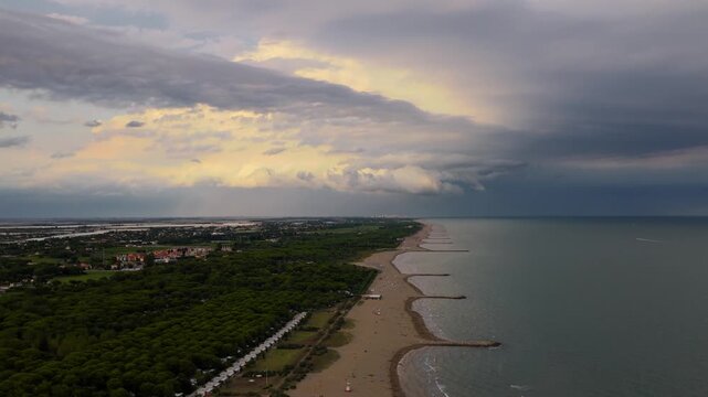 aerial view Of Stormy evening sky over Cavallino Treporti coastline, Italy