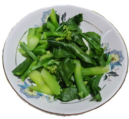 boiled kale serve in vintage ceramic plate
