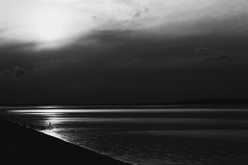 sunlight reflected on the Volga River, shot in black and white