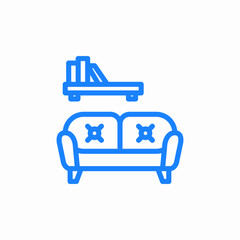 sofa with books icon sign vector