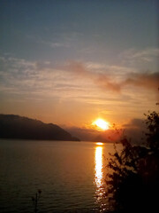 Golden sunrise over Danube Iron Gates Lake, Orsova, Romania