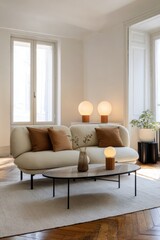 Modern living room with cream couch, coffee table, and lamps