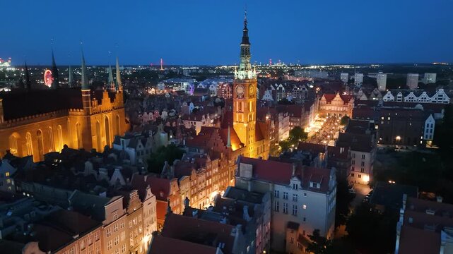 Architecture of old town in Gdansk with Main City Hall on Dluga street, Pomeranian Voivodeship, Poland. 