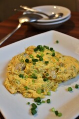 Chinese cuisine: stir-fried eggs, clams and leaf celery