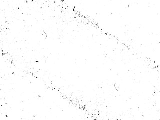 The image presents a distressed white surface, heavily marked with an array of black specks and imperfections, creating a textured effect of age and wear.