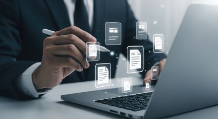 Professional reviewing digital document on laptop, representing data management and business workflow