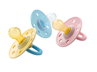 Three colorful baby pacifiers in yellow blue and pink for newborns on a black background