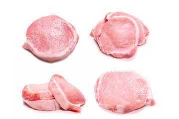 Raw pork pieces isolated on a white background.