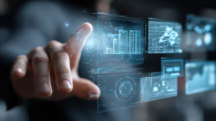 Person interacting with futuristic holographic interface displaying data visualizations and graphs, showcasing technology and innovation in modern setting