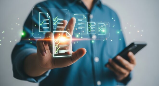 Man interacting with digital documents and data on a futuristic interface, symbolizing modern business processes and information management