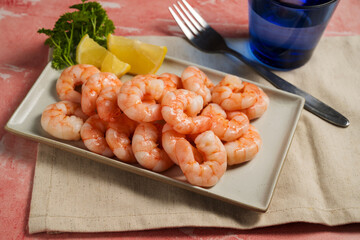 Peeled shrimp on a plate, seafood, shrimp, protein food