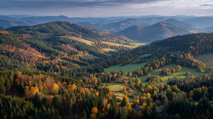 Fototapeta premium Forested hills of Czech Republic in autumn colors