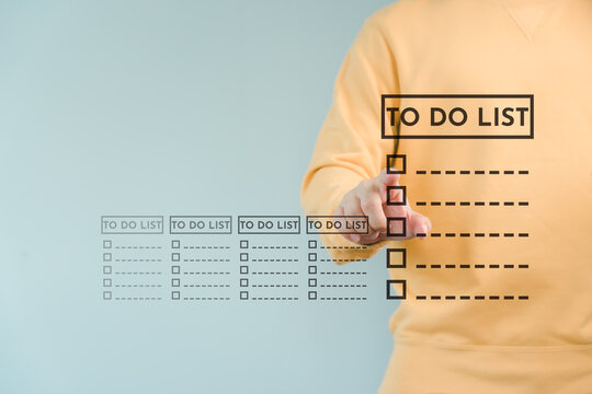 Person touch a digital to do list interface, symbolizing task management, productivity, organization, time management, goal setting and planning strategy with modern technology for daily efficiency.