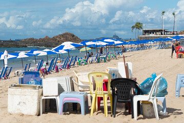 View of Farol da Barra beach full of bathers and tourists in the city of Salvador, Bahia.