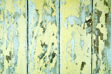 Vintage Weathered Wooden Planks with Yellow and Blue Patterns