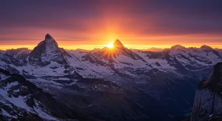 Majestic Matterhorn sunrise, vibrant sunset colors illuminating snow-capped peaks.