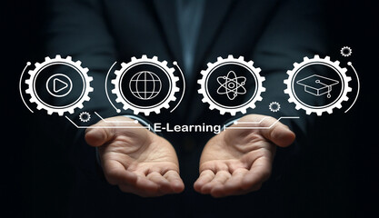 Hands Holding Symbols Representing E-Learning Concepts with Gears, Video Play, Globe, Science, and Graduation Cap Icons in a Dark Environment
