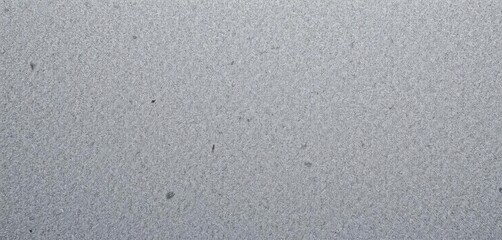 Subtle, nubby texture of grey felt  Woven fibers create a soft, slightly uneven surface,  subtle,  nubby