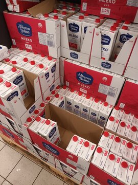 Boxes of Mleczna Dolina Milk on a Supermarket Pallet