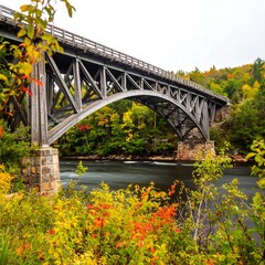 Autumnal bridge over a flowing river