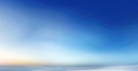 Fototapeta premium Graduated shades of blue sky and clouds.
