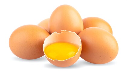 Pile of brown eggs, one cracked open, yolk visible