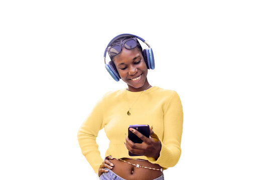 Young Woman Listening to Music and Using Smartphone