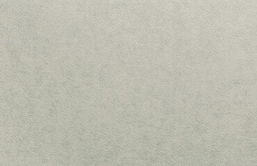 Eggshell-colored wallpaper with a burlap pattern